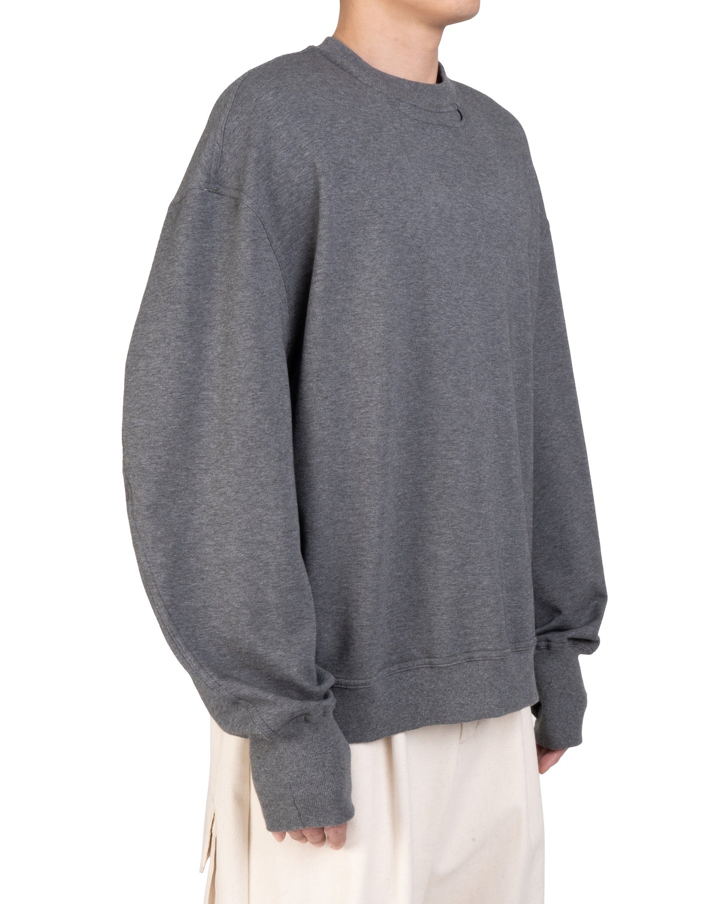 DIP POCKET SWEATER